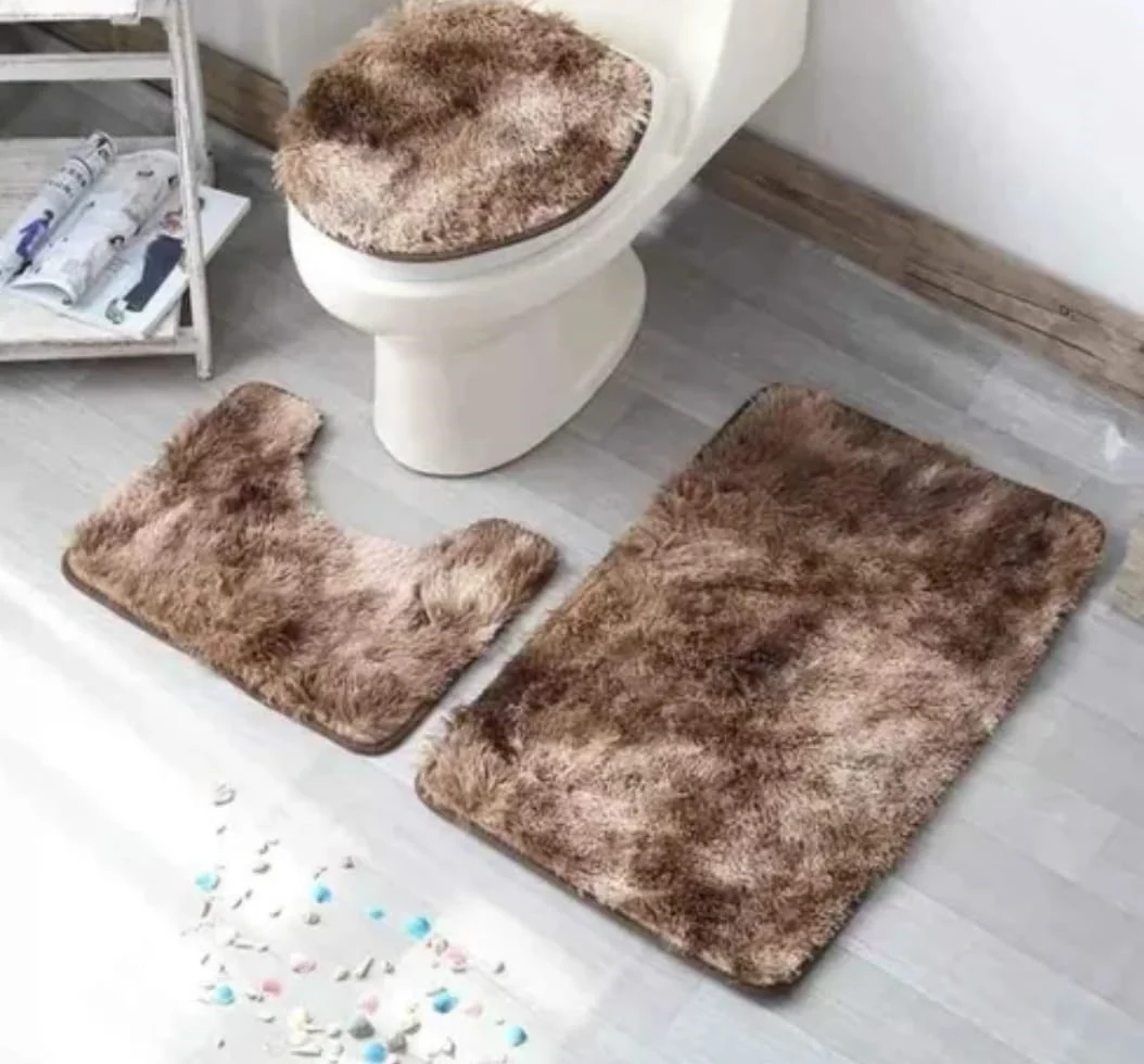 2b0573ce-ff64-434e-9211-56af64d2bd88.webp Set de Bano Peludo 3 Piezas Cafe Jaspeado - Imagen 1