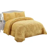 Plumon de invierno texturizado diseno hojas con chiporro King amarrillo
